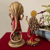 Lord Vishnu And Goddess Lakshmi Idol Cultured Marble Copper Finish - Decorative Home Decor - Crafts N Chisel - Indian Home Decor USA