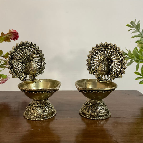 Dancing Peacock Diya(Set of 2) - Lightweight Brass lamp for Pooja - Crafts N Chisel - Indian Home Decor USA