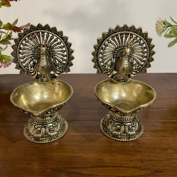 Dancing Peacock Diya(Set of 2) - Lightweight Brass lamp for Pooja - Crafts N Chisel - Indian Home Decor USA