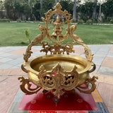 18.5” Decorative Lakshmi & Peacock Brass Urli - Ganesha Urli Bowl For Home Decor - Crafts N Chisel - Indian Home Decor USA