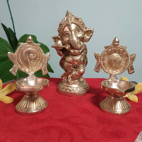 Flute Ganesh Brass Idol & Shanku and Chakra Diya Set-Crafts N Chisel - Indian handicrafts home decor USA