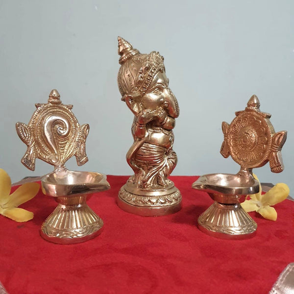 Flute Ganesh Brass Idol & Shanku and Chakra Diya Set-Crafts N Chisel - Indian handicrafts home decor USA