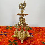 Handmade Standing Brass Diya Lamp : Dancing Peacock - Crafts N Chisel - Indian Home Decor USA