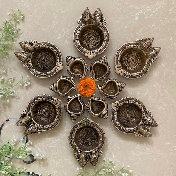 Lakshmi Ganesha And Shank Small Diya (Set of 12) - Handmade Brass lamp - Decorative-Crafts N Chisel USA - Indian Home Decor USA