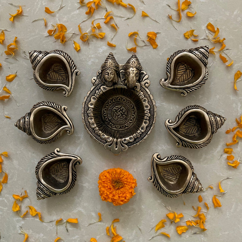 Lakshmi Ganesha And Shank Small Diya (Set of 7) - Handmade Brass lamp - Decorative-Crafts N Chisel USA - Indian Home Decor USA